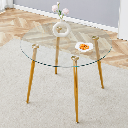 Round dining table with glass top, gilded metal legs, exquisite living, starting from the details, the gold legs show an extraordinary texture, which is the finishing touch to your home